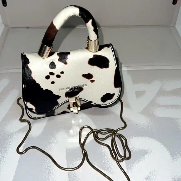 Mini discount cow purse